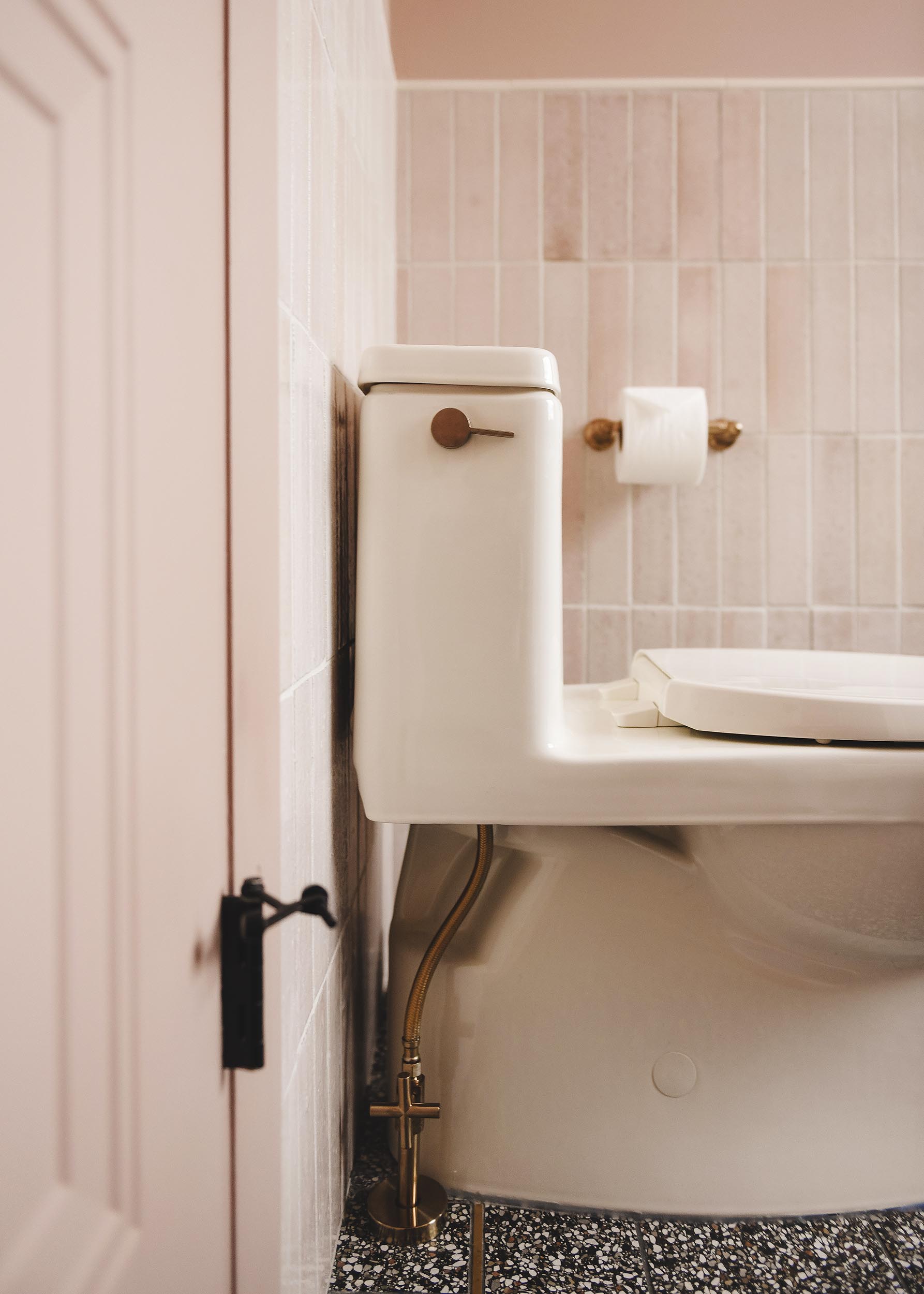 toilet detail showing brass handle | via Yellow Brick Home