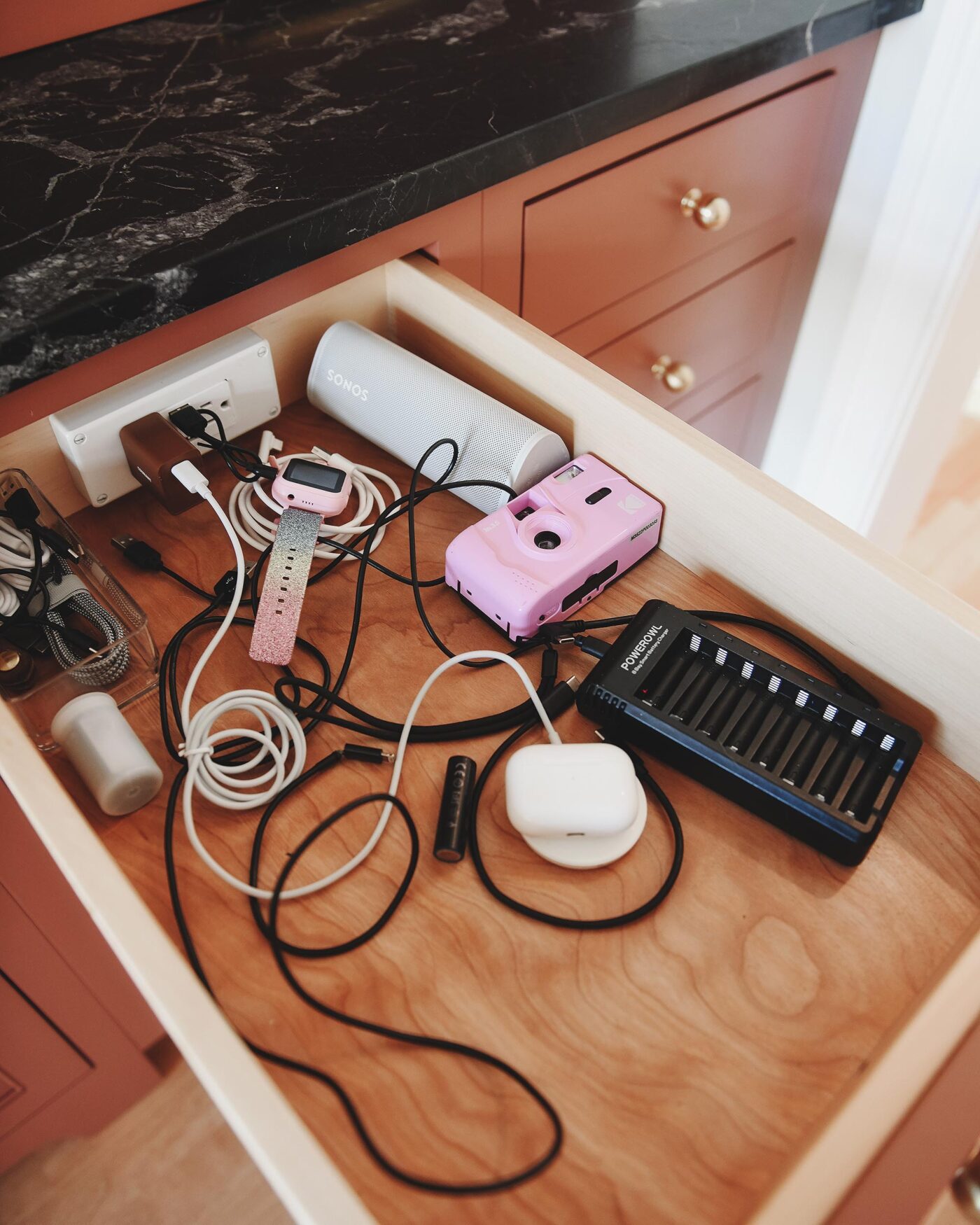 Charging drawer cord clutter | via Yellow Brick Home