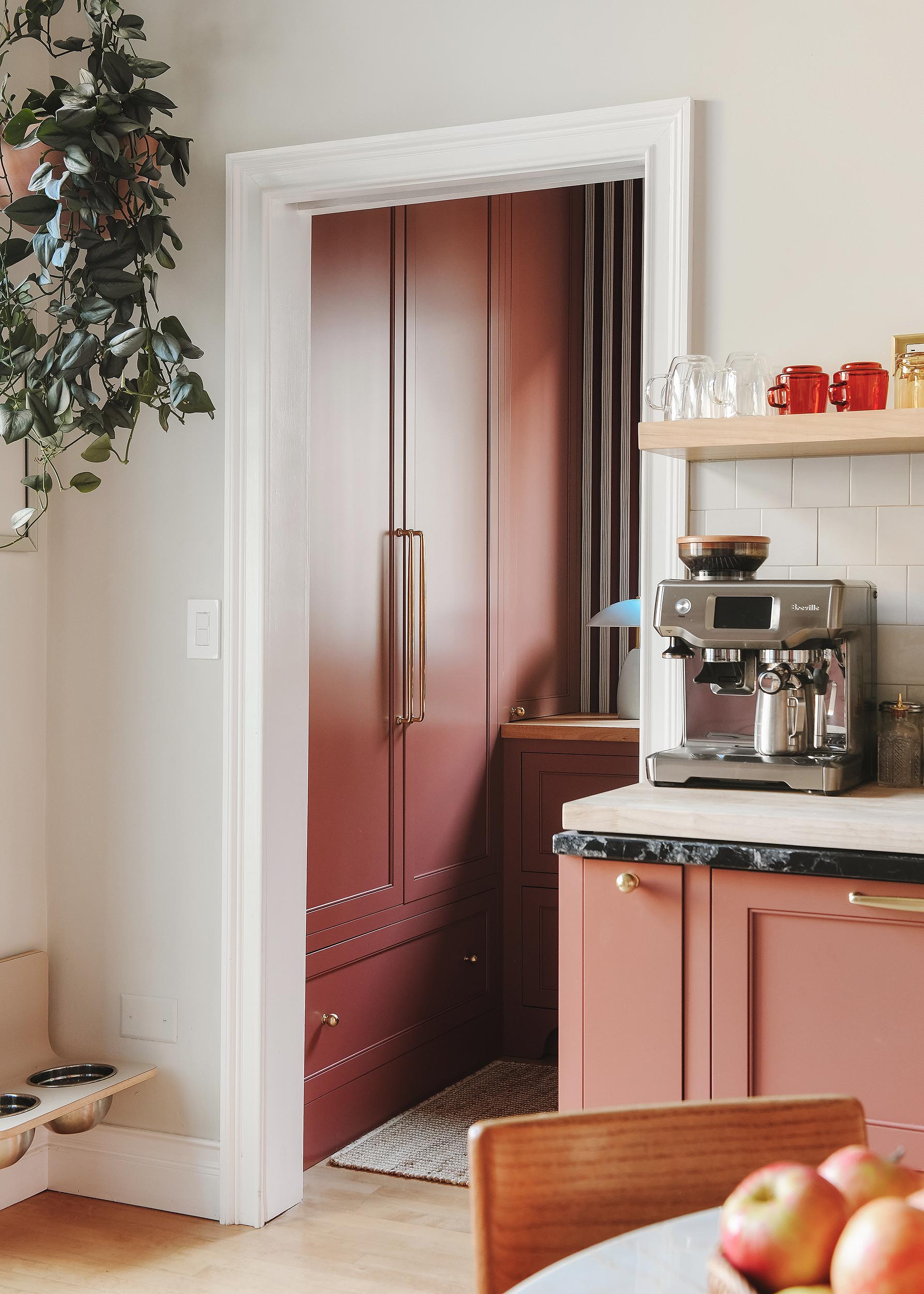 The view from our kitchen into the new custom pantry // via Yellow Brick Home