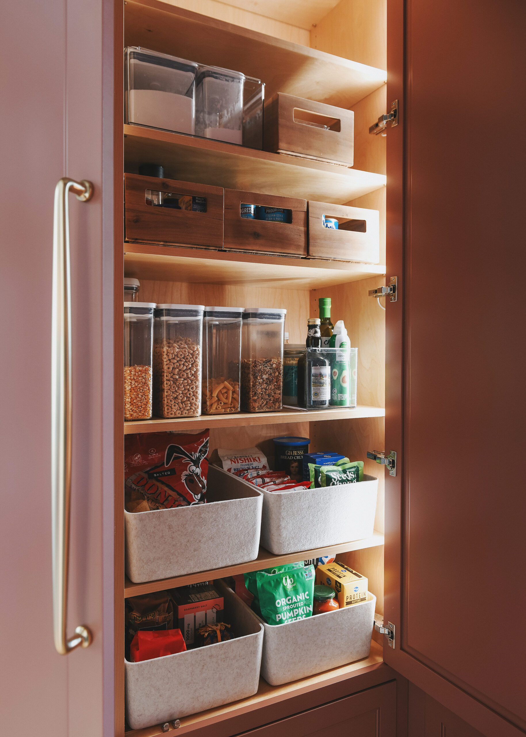 The left pantry cabinet // via Yellow Brick Home