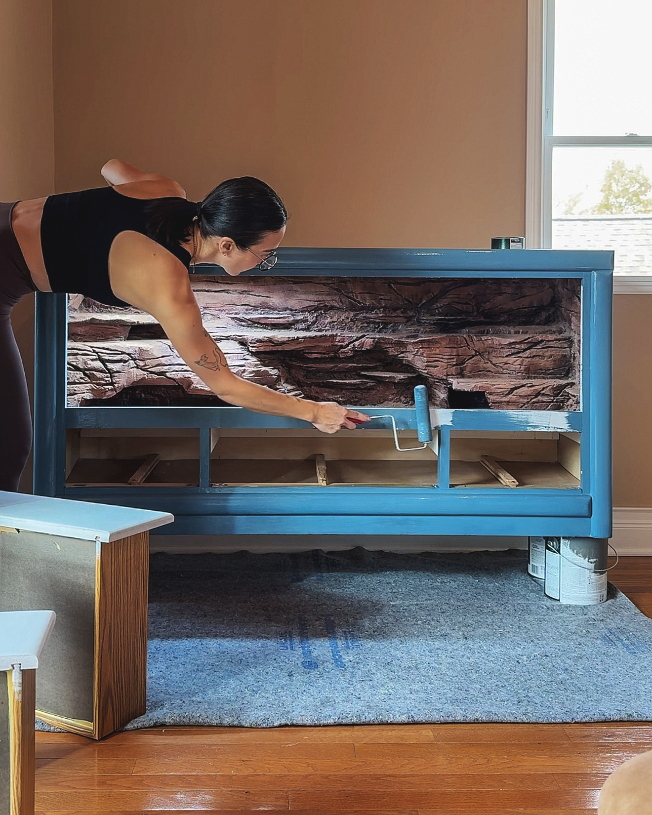 Painting the dresser // via Yellow Brick Home