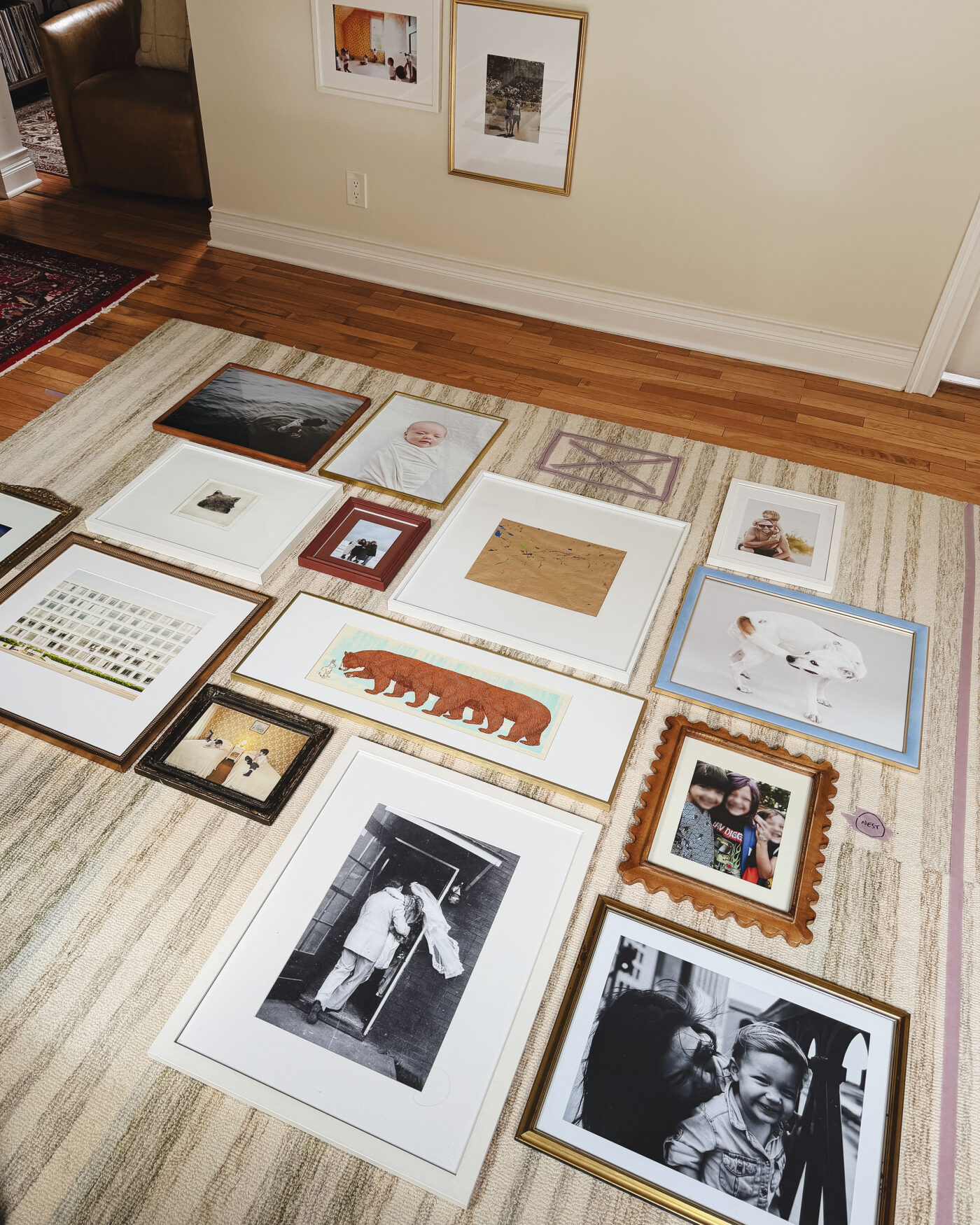 The 'flat lay' of our gallery wall prior to hanging // via Yellow Brick Home