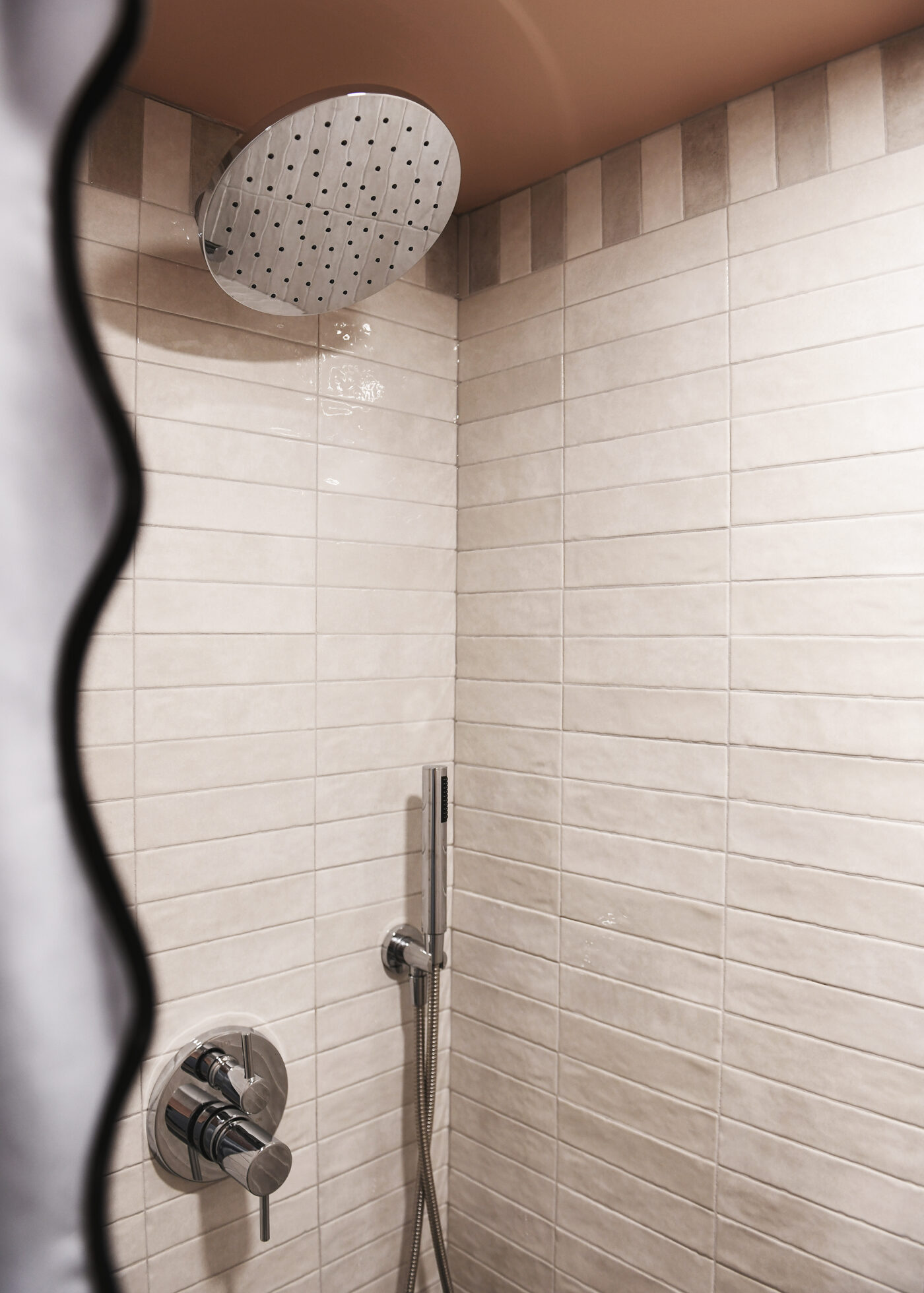 The completed bathroom with additional lighting, a raised ceiling, fresh tile and a whole lot of color // via Yellow Brick Home