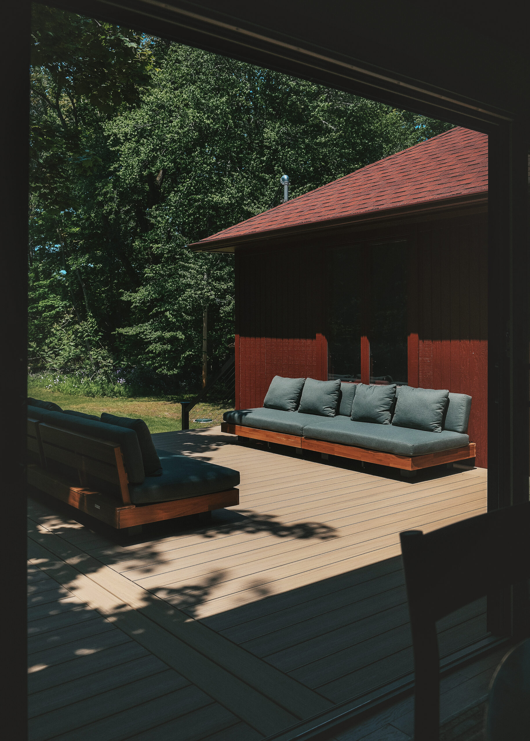 The completed TimberTech deck from inside our Michigan Red House // via Yellow Brick home