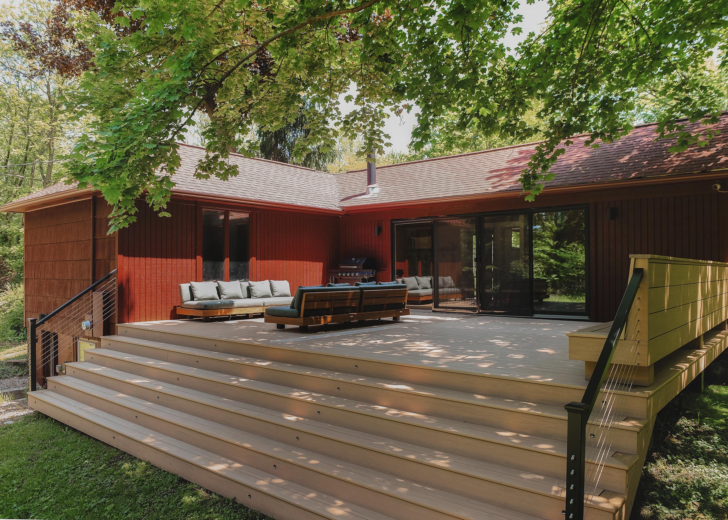 The completed TimberTech deck at our Michigan Red House // via Yellow Brick home