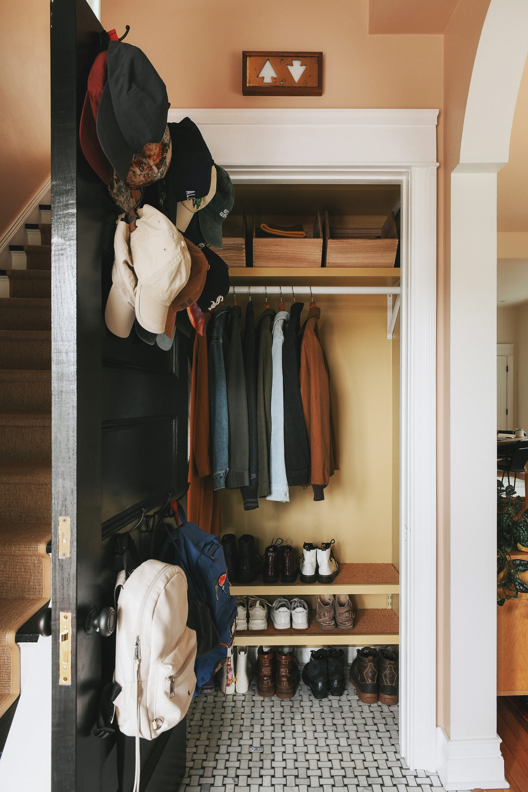 The freshly organized coat closet  // via Yellow Brick Home