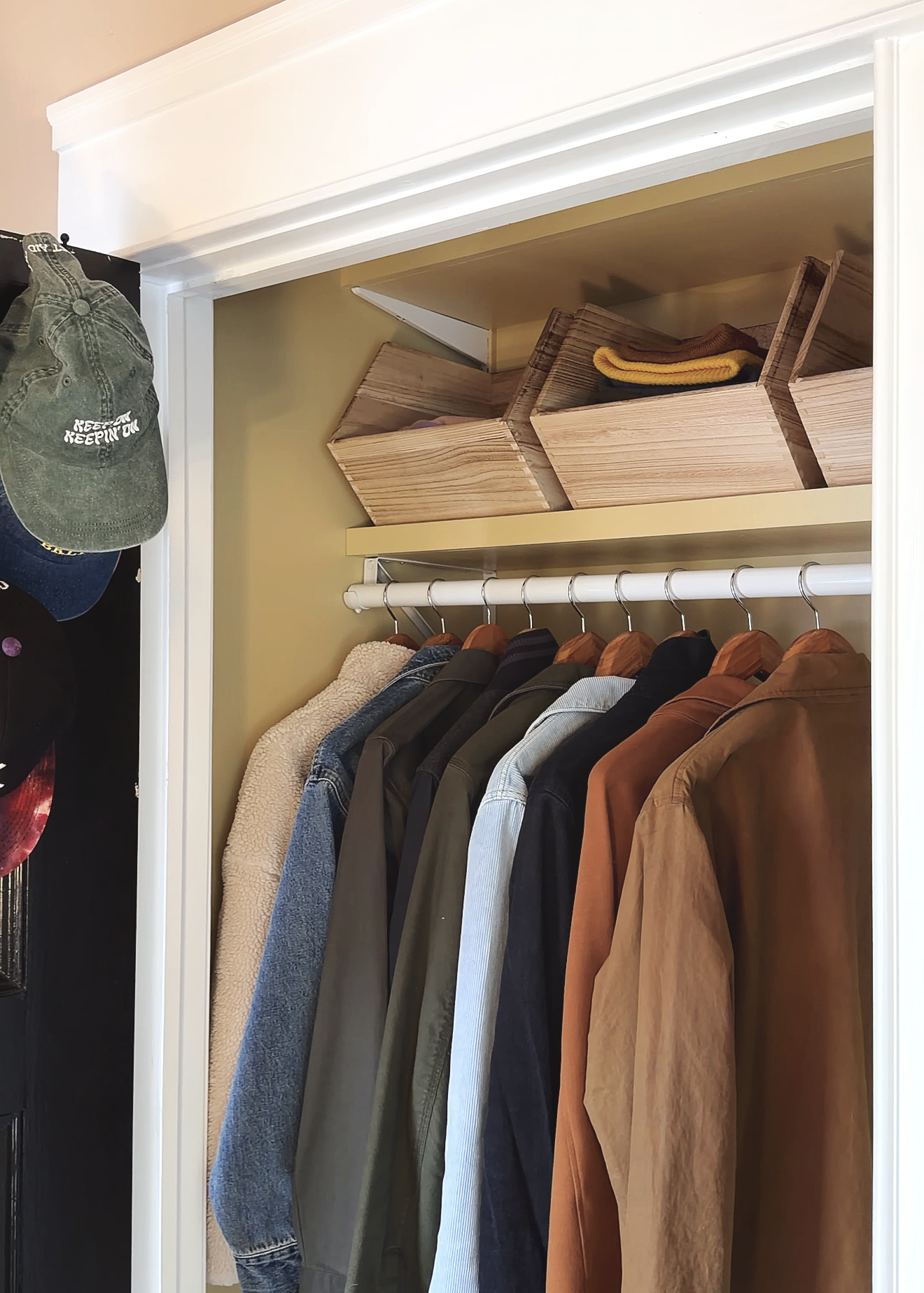 Lots of space for coats and accessories in the new coat closet layout // via Yellow Brick Home