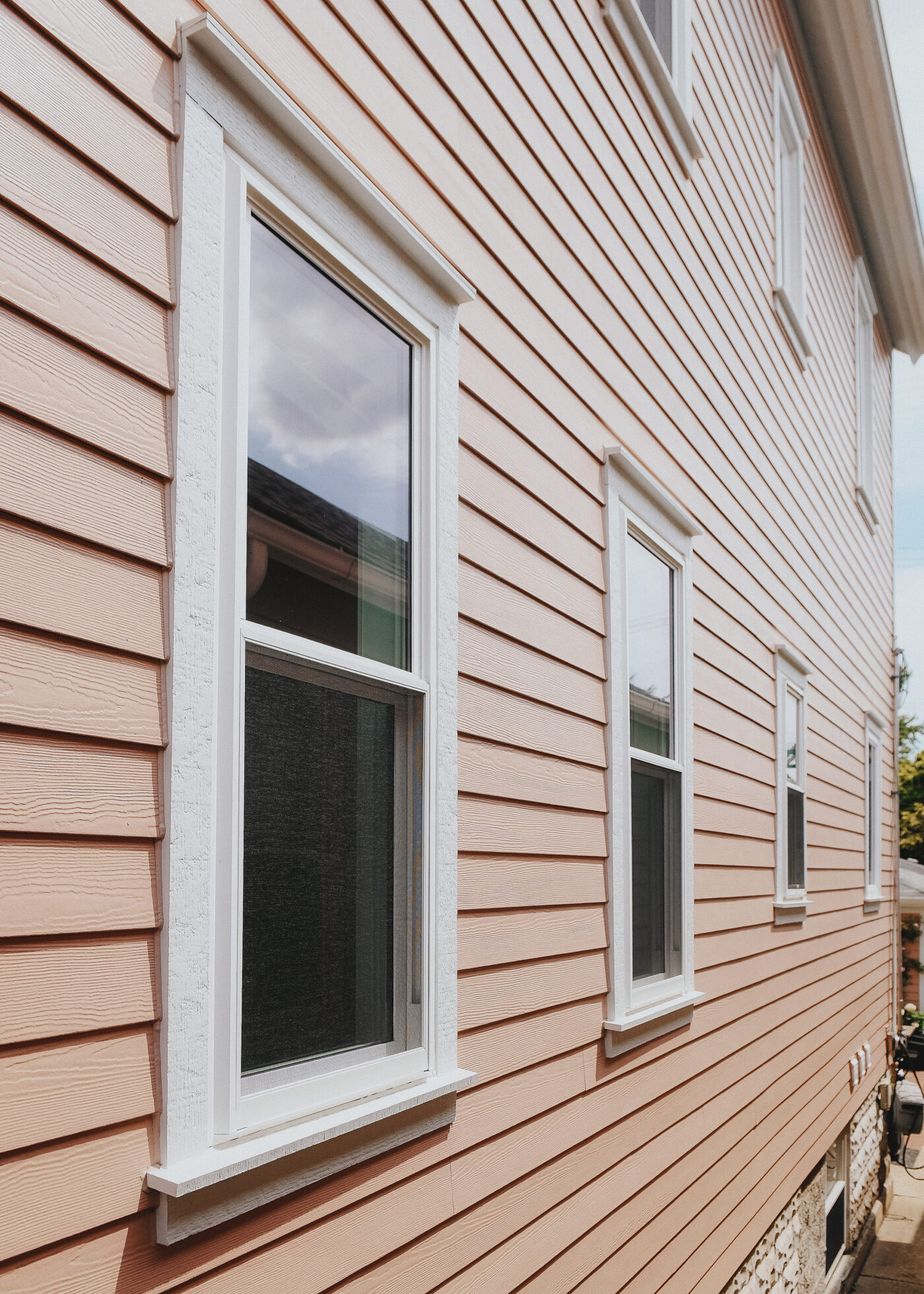 The completed exterior of our Chicago home, freshly clad in James Hardie plank siding // via Yellow Brick Home
