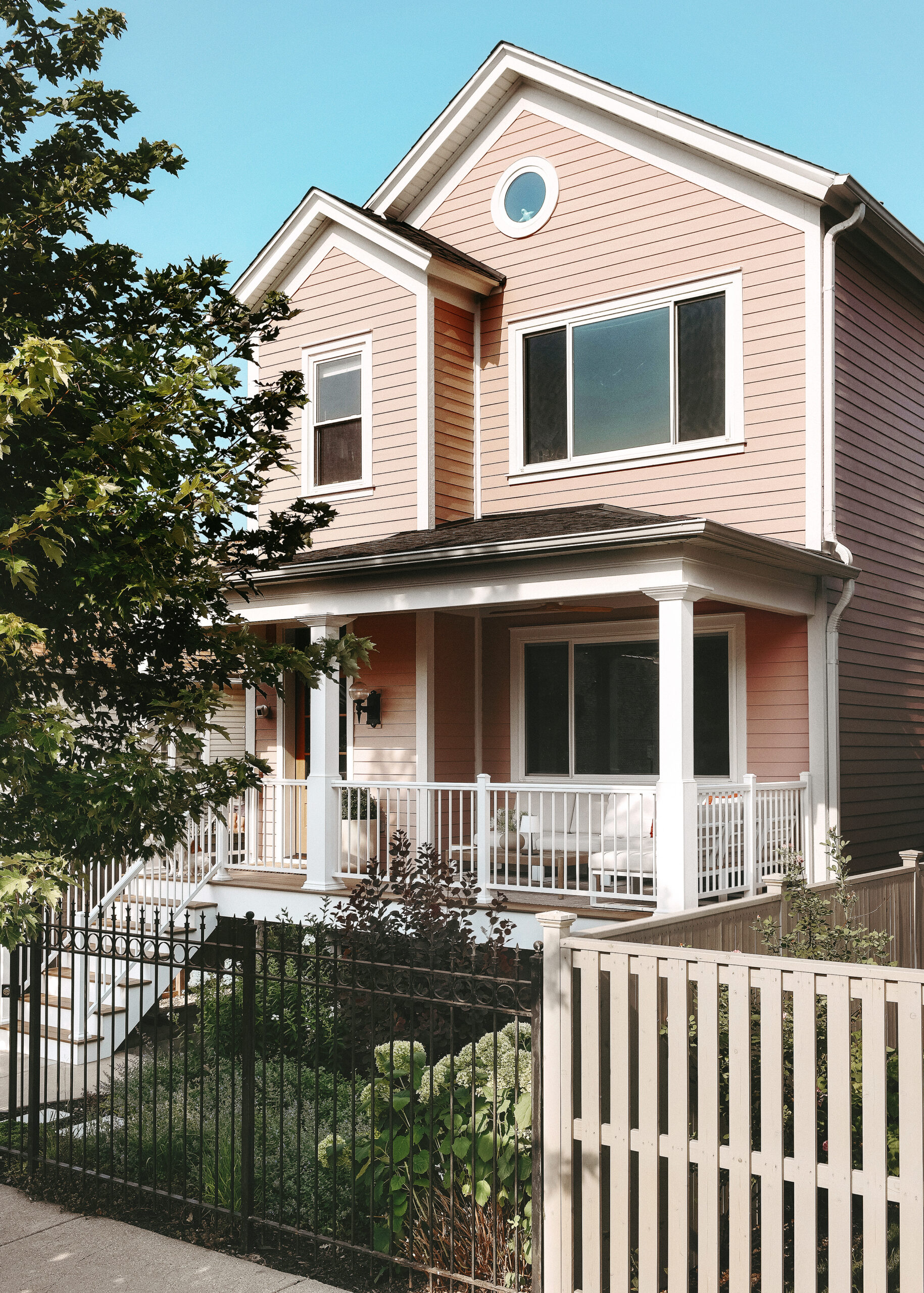 The completed exterior of our Chicago home, freshly clad in James Hardie plank siding // via Yellow Brick Home