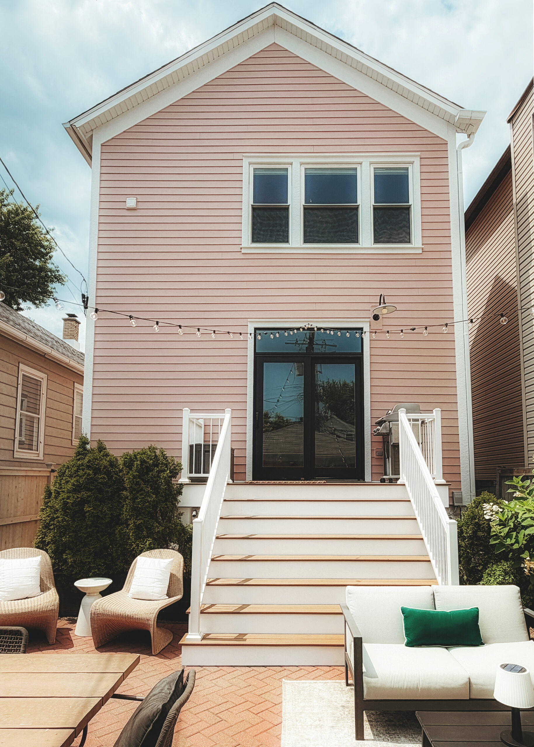 The completed exterior of our Chicago home, freshly clad in James Hardie plank siding // via Yellow Brick Home