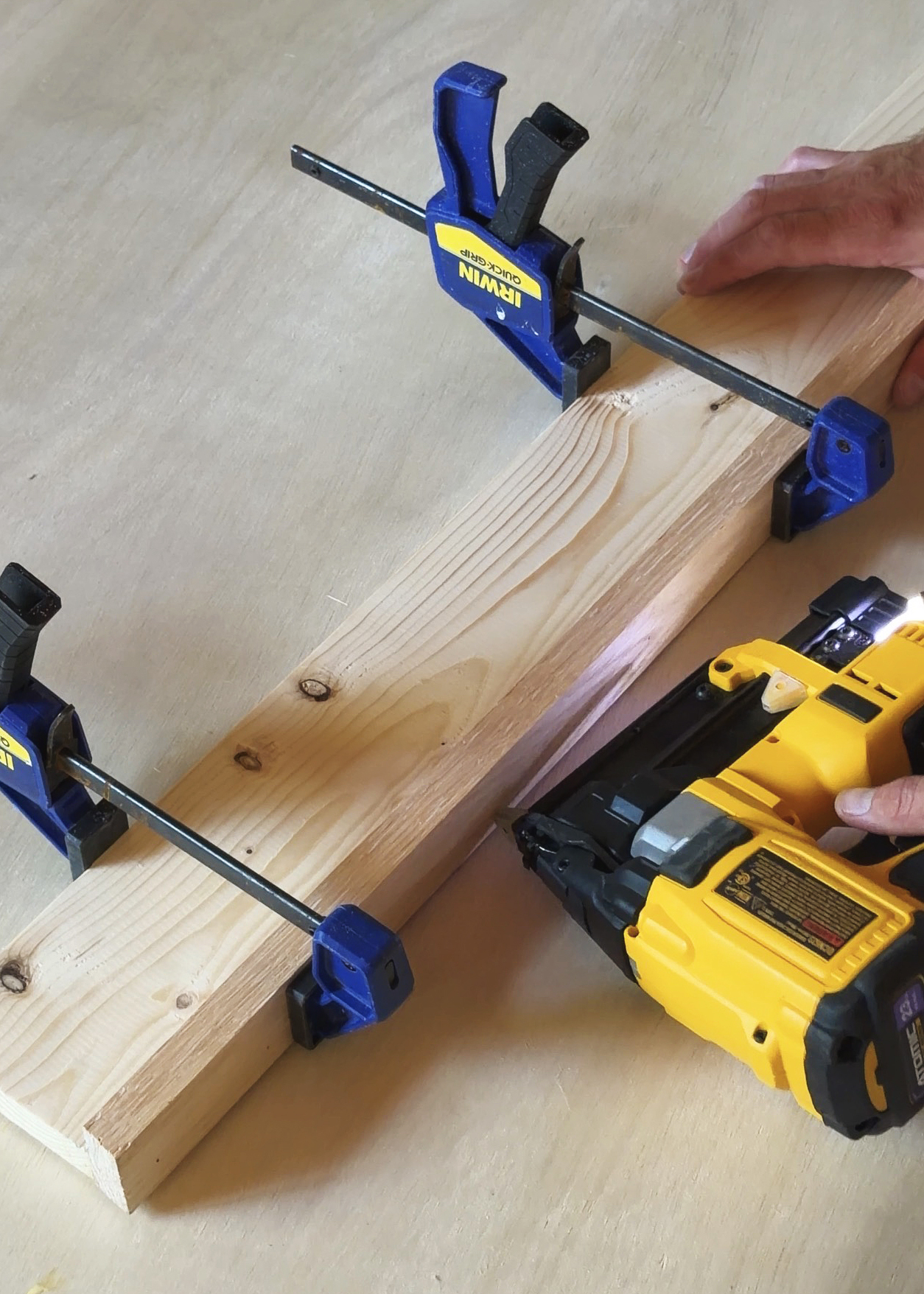 Nailing the pine backing board to the oak finished sized // via Yellow Brick Home
